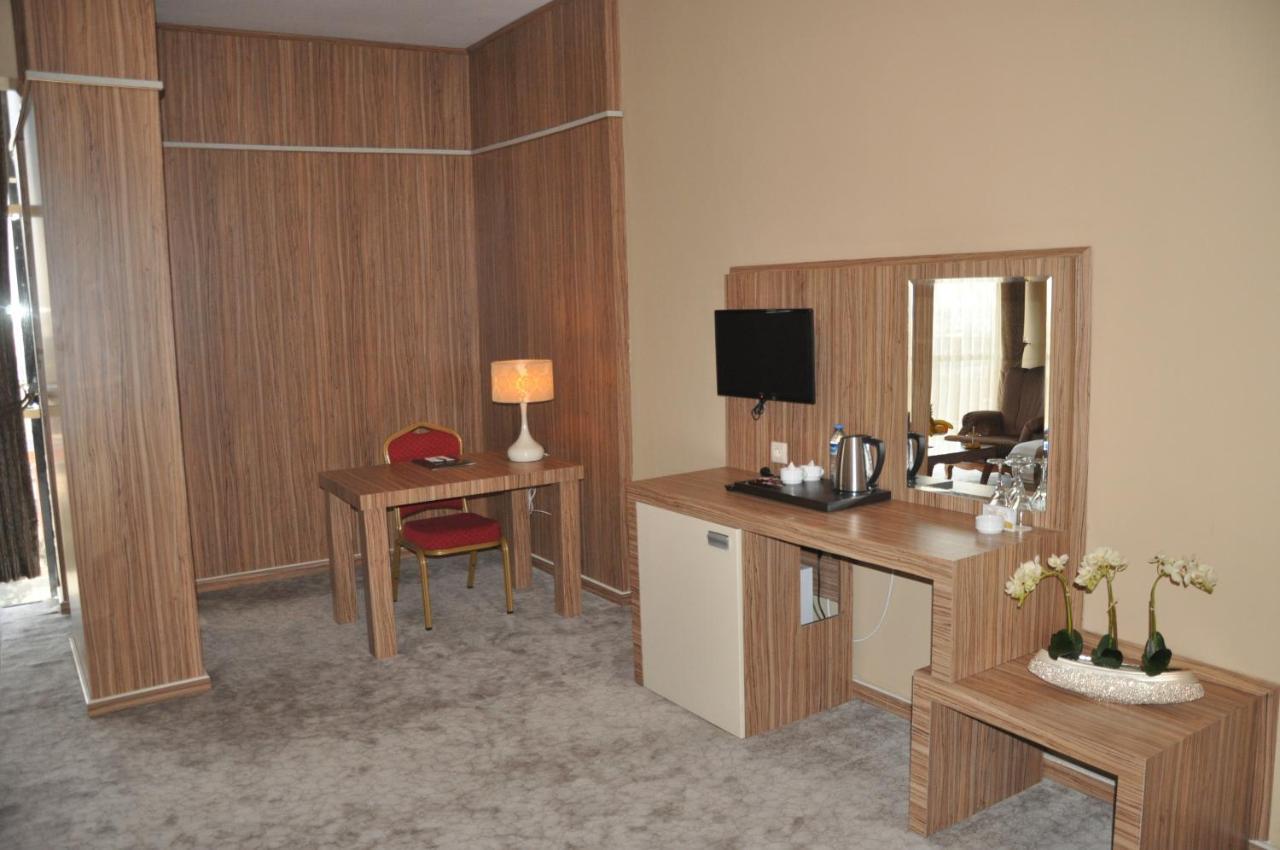 Mesa Hotel Batman Quarto foto